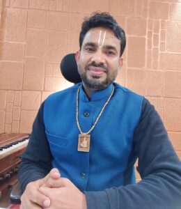 Baba shri raj mahajan with open book