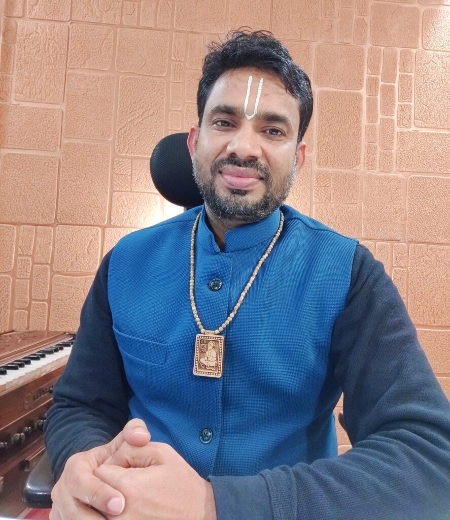 Baba shri raj mahajan with open book