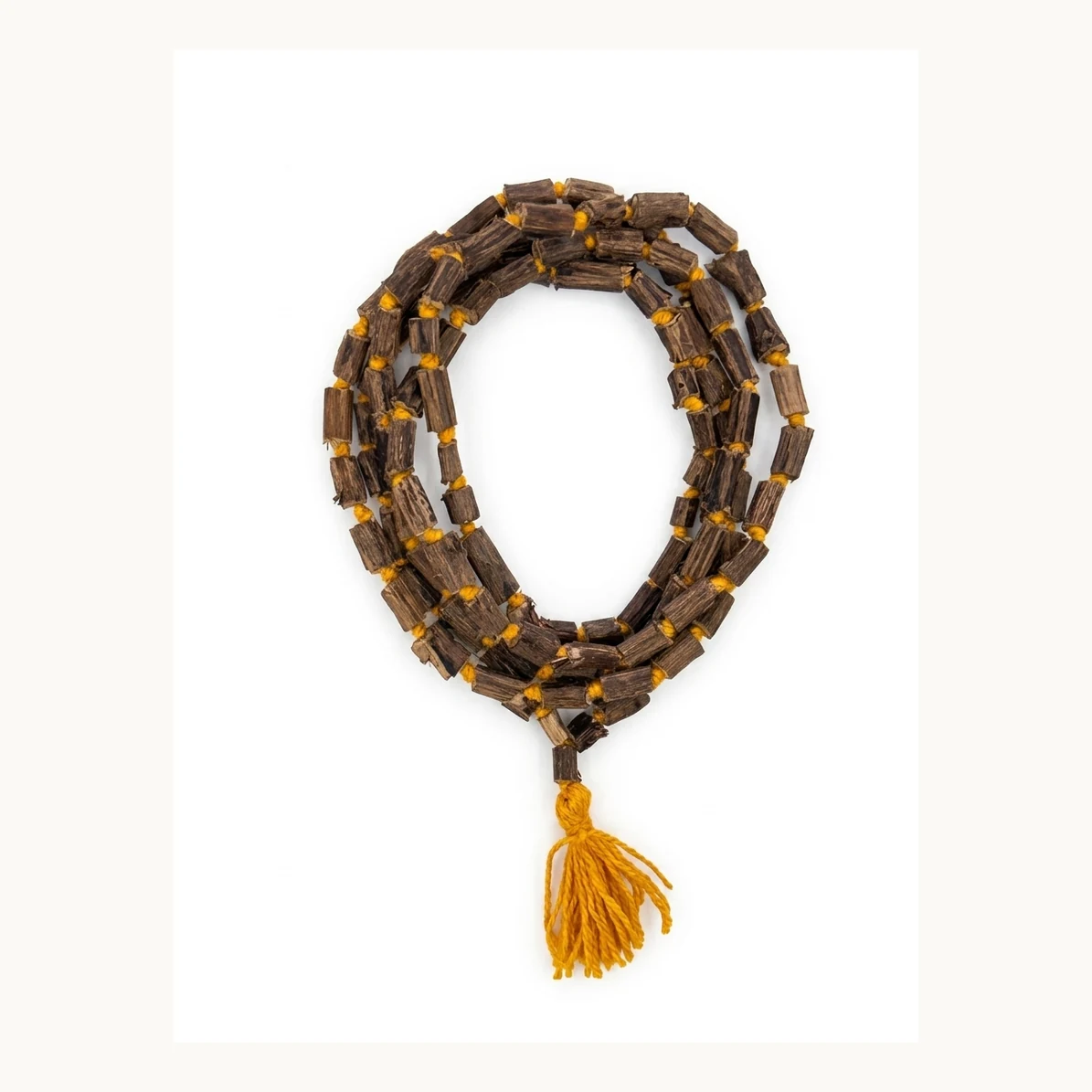 Detail view of original Shyama Tulsi double-round kanthi mala dark brown beads