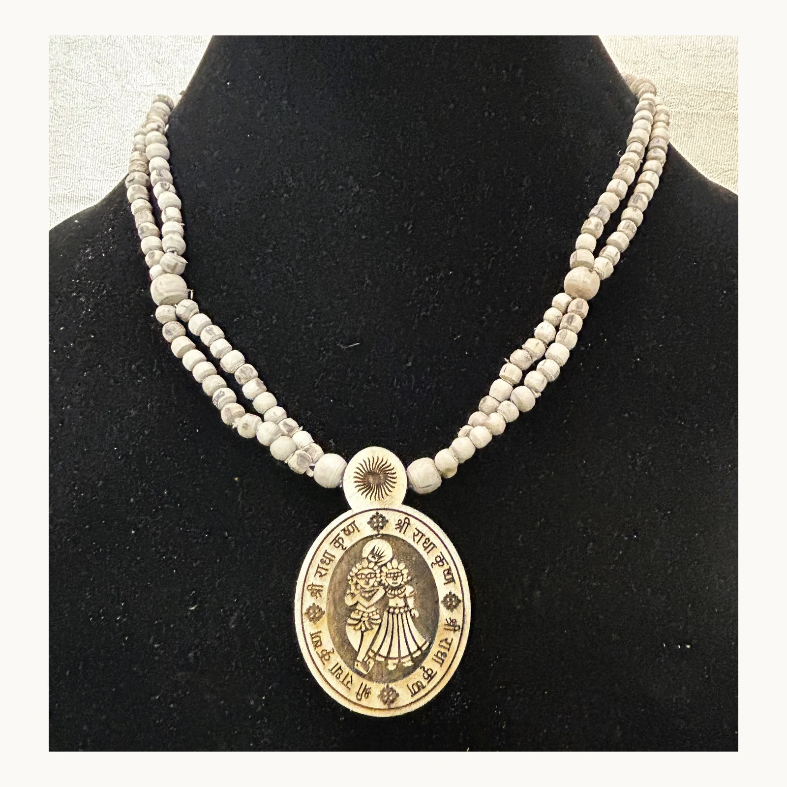 Natural Tulsi double-chain mala with Radha Krishna pendant front view